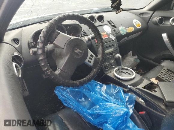 2005 Nissan 350Z Touring z VIN JN1AZ34E05M654954, wystawiony jako Copart lot #57591085 z przebiegiem Nie podano mil oraz Tytuł czysty. Historia ofert i sprzedaży dostępna na DreamBid. Obrazek 8.