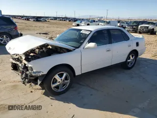 1992 Toyota Camry LE with VIN 4T1SK12E8NU044387, listed as a Copart auction lot 43195915 with 279,199 mi miles and Salvage Title. Bid and sale history available at carsss.com. Image 1.
