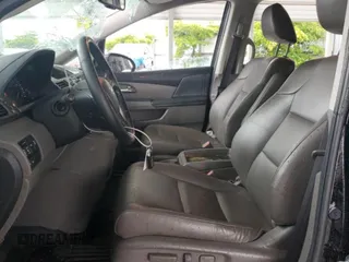 2015 Honda Odyssey Touring Elite с VIN 5FNRL5H91FB107793, выставлен на аукционе Copart как лот 59295355 с пробегом 91 910 миль миль и Списание • Salvage title. История ставок и продаж доступна на DreamBid. Изображение 7.