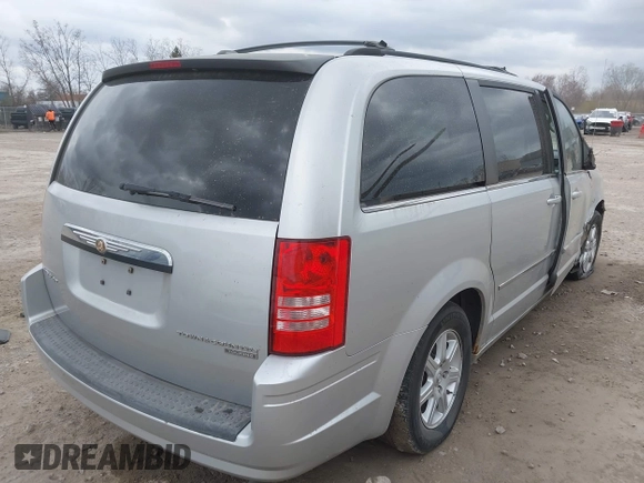 2010 Chrysler Town & Country Touring with VIN 2A4RR5D1XAR195748, listed as a IAAI auction lot 42029882 with 136,905 mi miles. Bid and sale history available at carsss.com. Image 4.
