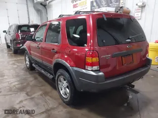 2003 Ford Escape XLT Popular 2 with VIN 1FMCU93173KA52806, listed as a IAAI auction lot 41696250 with 138,338 mi miles. Bid and sale history available at carsss.com. Image 3.