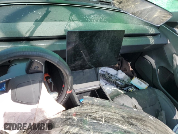 2025 Tesla Model 3 Long Range with VIN 5YJ3E1EA5SF999984, listed as a Copart auction lot 58244825 with Not provided miles and Salvage title. Bid and sale history available at DreamBid. Image 9.