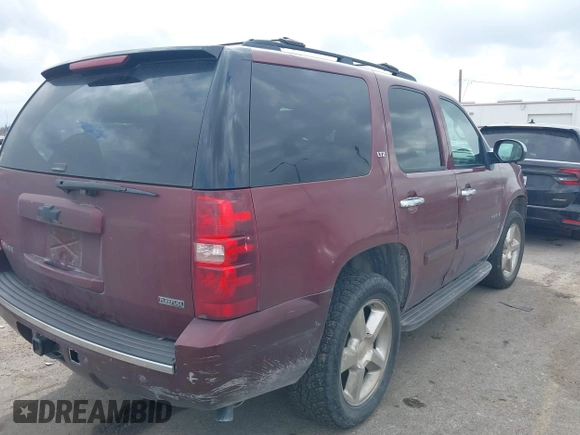 2008 Chevrolet Tahoe 3LT with VIN 1GNFC13048J117418, listed as a IAAI auction lot 41707093 with 232,410 mi miles and . Bid and sale history available at DreamBid. Image 4.