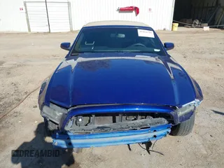 2014 Ford Mustang V6 z VIN 1ZVBP8EM5E5315477, wystawiony jako IAAI lot #42222514 z przebiegiem 215 618 mil mil oraz . Historia ofert i sprzedaży dostępna na DreamBid. Obrazek 12.