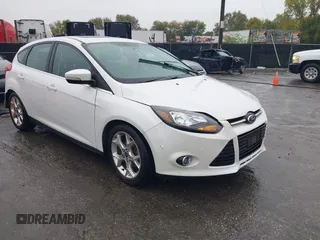 2014 Ford Focus Titanium with VIN 1FADP3N25EL254128, listed as a IAAI auction lot 37866454 with 94,118 mi miles and . Bid and sale history available at DreamBid. Image 1.