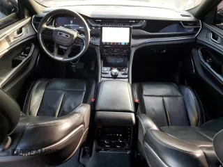 2023 Jeep Grand Cherokee Overland with VIN 1C4RJHDG8PC502208, listed as a Copart auction lot 86927734 with 53,732 mi miles and Salvage title. Bid and sale history available at DreamBid. Image 8.