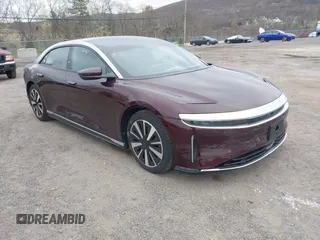 2023 Lucid Air Touring z VIN 50EA1TEA9PA005542, wystawiony jako IAAI lot #42080545 z przebiegiem 20 879 mil mil oraz . Historia ofert i sprzedaży dostępna na DreamBid. Obrazek 1.