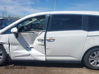 2016 Honda Odyssey EX-L with VIN 5FNRL5H62GB048406, listed as a IAAI auction lot 42145352 with 126,938 mi miles and . Bid and sale history available at carsss.com. Image 14.