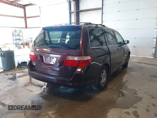 2007 Honda Odyssey EX-L with VIN 5FNRL38727B066885, listed as a IAAI auction lot 41317374 with 220,243 mi miles. Bid and sale history available at carsss.com. Image 4.