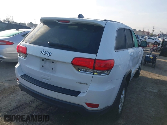 2017 Jeep Grand Cherokee Laredo with VIN 1C4RJEAG3HC696635, listed as a IAAI auction lot 41594123 with 97,502 mi miles. Bid and sale history available at carsss.com. Image 4.