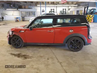 2014 MINI Clubman S z VIN WMWZG3C52ET800765, wystawiony jako Copart lot #76470874 z przebiegiem 103 971 mil mil oraz Szkoda całkowita • Salvage title. Historia ofert i sprzedaży dostępna na DreamBid. Obrazek 2.