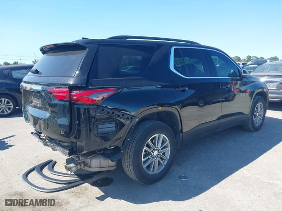 2023 Chevrolet Traverse LT Cloth with VIN 1GNERGKW2PJ289979, listed as a IAAI auction lot 41848294 with 35,708 mi miles. Bid and sale history available at carsss.com. Image 4.