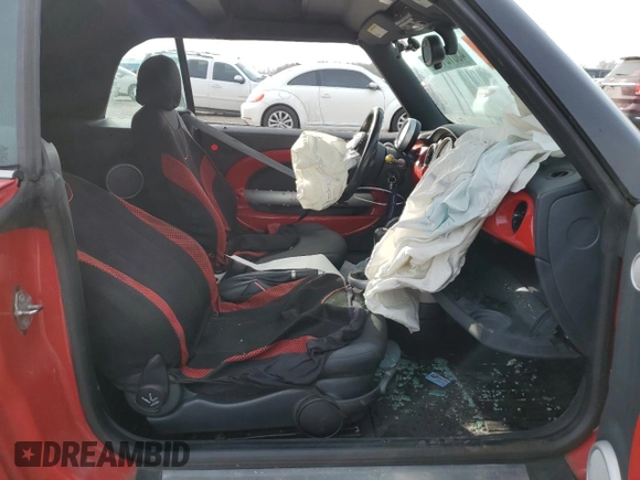 2005 MINI Convertible with VIN WMWRF33525TG12494, listed as a Copart auction lot 43010175 with Not provided miles and Salvage title. Bid and sale history available at DreamBid. Image 7.