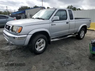 2000 Nissan Frontier XE with VIN 1N6ED26T0YC314102, listed as a Copart auction lot 83678264 with 174,419 mi miles and Salvage title. Bid and sale history available at DreamBid. Image 1.