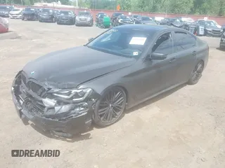 2023 BMW 5 Series M550i xDrive with VIN WBA13BK02PCN47443, listed as a IAAI auction lot 42290388 with Not provided miles and . Bid and sale history available at DreamBid. Image 17.