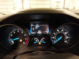 2015 Ford Focus SE with VIN 1FADP3F24FL255450, listed as a IAAI auction lot 41673301 with 103,650 mi miles. Bid and sale history available at carsss.com. Image 7.