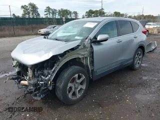 2018 Honda CR-V EX with VIN 7FARW2H51JE043660, listed as a IAAI auction lot 41952272 with 58,536 mi miles and . Bid and sale history available at DreamBid. Image 2.