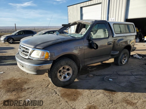 2003 Ford F-150 XL with VIN 1FTRF072X3KC94240, listed as a Copart auction lot 86130954 with 101,042 mi miles and Salvage title. Bid and sale history available at DreamBid. Image 1.