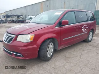 2014 Chrysler Town & Country Touring with VIN 2C4RC1BG0ER211128, listed as a IAAI auction lot 41960992 with 133,055 mi miles and . Bid and sale history available at DreamBid. Image 2.