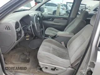2005 GMC Envoy SLT with VIN 1GKET16S656102004, listed as a Copart auction lot 74543124 with Not Provided miles and Salvage Title. Bid and sale history available at DreamBid. Image 7.