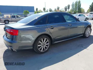 2014 Audi A6 3.0T Prestige with VIN WAUHGAFC9EN028196, listed as a IAAI auction lot 41993806 with 100,215 mi miles. Bid and sale history available at carsss.com. Image 4.