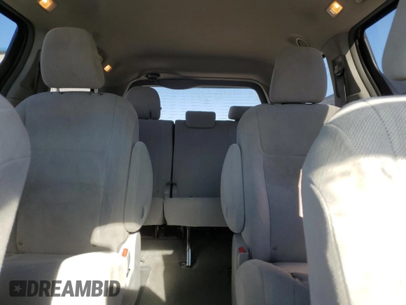 2019 Toyota Sienna L with VIN 5TDZZ3DC6KS013290, listed as a Copart auction lot 49493685 with 76,416 mi miles and Salvage Title. Bid and sale history available at carsss.com. Image 10.