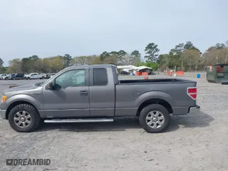 2013 Ford F-150 XL with VIN 1FTEX1CM8DFB14529, listed as a IAAI auction lot 41874583 with 157,757 mi miles. Bid and sale history available at carsss.com. Image 14.
