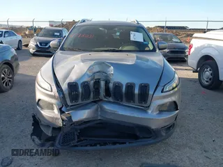 2015 Jeep Cherokee Latitude z VIN 1C4PJMCS3FW673872, wystawiony jako IAAI lot #41778031 z przebiegiem 173 845 mil mil oraz . Historia ofert i sprzedaży dostępna na DreamBid. Obrazek 12.