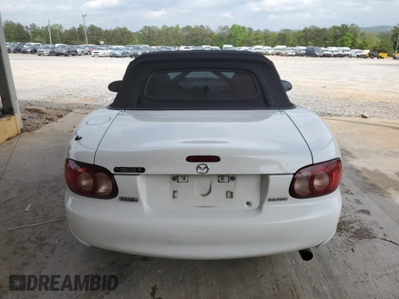 2004 Mazda MX-5 Miata LS z VIN JM1NB353640407864, wystawiony jako Copart lot #53951315 z przebiegiem 116 295 mil mil oraz Szkoda całkowita • Salvage title. Historia ofert i sprzedaży dostępna na DreamBid. Obrazek 6.
