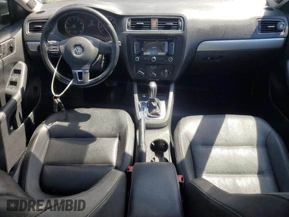 2012 Volkswagen Jetta SEL with VIN 3VWLP7AJ0CM327814, listed as a Copart auction lot 52235685 with 97,705 mi miles and Salvage title. Bid and sale history available at DreamBid. Image 8.