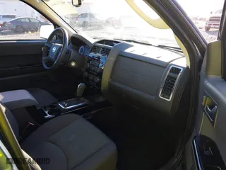 2010 Mazda Tribute Touring with VIN 4F2CY9C73AKM04595, listed as a IAAI auction lot 40797681 with 122,774 mi miles. Bid and sale history available at carsss.com. Image 5.