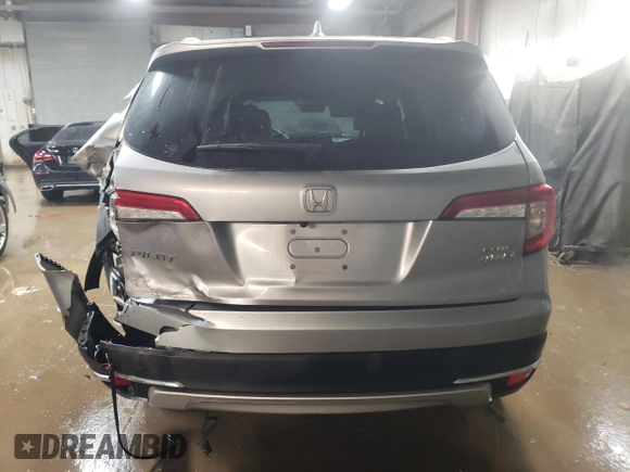 2021 Honda Pilot Elite with VIN 5FNYF6H04MB053008, listed as a Copart auction lot 87802955 with 70,737 mi miles and Salvage Title. Bid and sale history available at carsss.com. Image 6.
