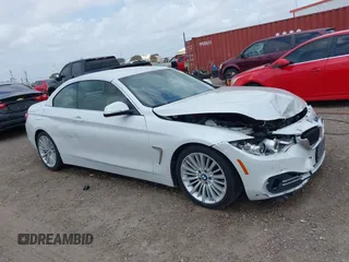 2015 BMW 4 Series 428i z VIN WBA3V5C53FP751805, wystawiony jako IAAI lot #42150102 z przebiegiem 113 381 mil mil oraz . Historia ofert i sprzedaży dostępna na DreamBid. Obrazek 13.