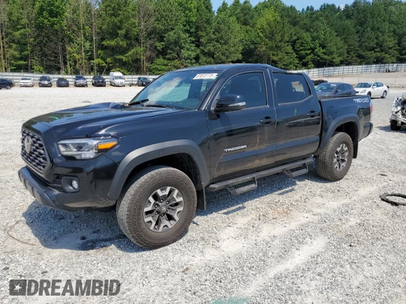 2023 Toyota Tacoma SR with VIN 3TMCZ5AN3PM571922, listed as a Copart auction lot 61872775 with 34,501 mi miles and Salvage title. Bid and sale history available at DreamBid. Image 1.