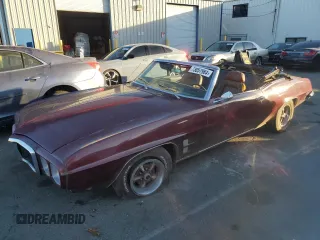 1969 Pontiac GTO z VIN 223679N112116, wystawiony jako Copart lot #73057984 z przebiegiem 78 260 mil mil oraz Czysty tytuł • Clean title. Historia ofert i sprzedaży dostępna na DreamBid. Obrazek 1.