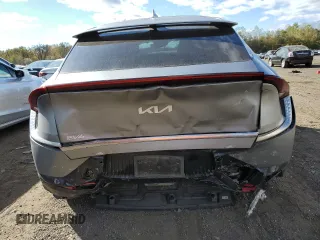 2022 Kia EV6 GT-Line with VIN KNDC3DLC2N5027633, listed as a Copart auction lot 76138314 with 64,558 mi miles and Salvage Title. Bid and sale history available at carsss.com. Image 6.