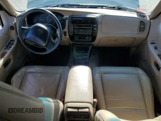 2000 Mercury Mountaineer z VIN 4M2DU86P0YUJ09470, wystawiony jako Copart lot #80207394 z przebiegiem 119 634 mil mil oraz Czysty tytuł • Clean title. Historia ofert i sprzedaży dostępna na DreamBid. Obrazek 8.