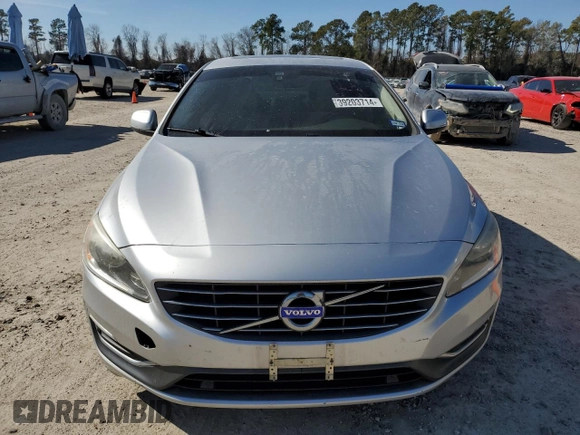 2015 Volvo S60 T5 Drive-E Premier with VIN YV140MFK7F2355479, listed as a Copart auction lot 39203714 with 106,920 mi miles. Bid and sale history available at carsss.com. Image 5.