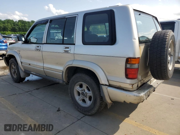 1999 Isuzu Trooper S with VIN JACDJ58X6X7924973, listed as a Copart auction lot 57881235 with 269,301 mi miles and Salvage title. Bid and sale history available at DreamBid. Image 2.