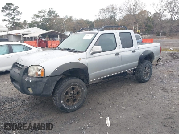 2001 Nissan Frontier SE z VIN 1N6ED27T91C318489, wystawiony jako IAAI lot #41441798 z przebiegiem 214 834 mil mil oraz . Historia ofert i sprzedaży dostępna na DreamBid. Obrazek 2.