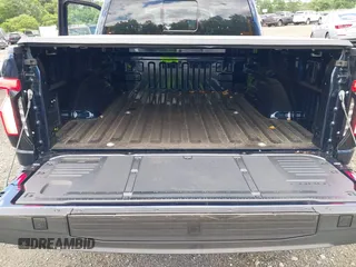 2023 Ford F-150 Lightning Pro с VIN 1FT6W1EVXPWG42428, выставлен на аукционе IAAI как лот 39711091 с пробегом 6 308 миль миль и . История ставок и продаж доступна на DreamBid. Изображение 19.