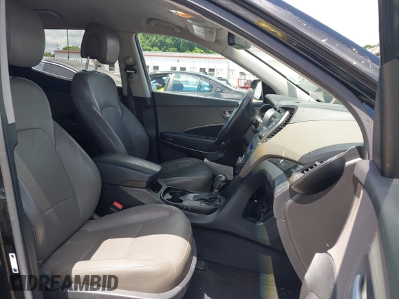 2013 Hyundai Santa Fe Sport z VIN 5XYZUDLA1DG050879, wystawiony jako IAAI lot #42236937 z przebiegiem 124 779 mil mil oraz . Historia ofert i sprzedaży dostępna na DreamBid. Obrazek 5.