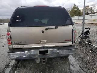 2001 GMC Yukon SLT z VIN 1GKEC13T51J145673, wystawiony jako Copart lot #83568954 z przebiegiem 310 415 mil mil oraz Szkoda całkowita • Salvage title. Historia ofert i sprzedaży dostępna na DreamBid. Obrazek 6.