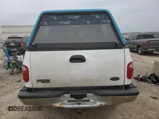 2000 Ford F-150 XL with VIN 2FTRX08L0YCA70958, listed as a Copart auction lot 44517605 with 237,228 mi miles and Salvage title. Bid and sale history available at DreamBid. Image 6.