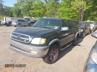 2000 Toyota Tundra SR5 with VIN 5TBBT4412YS082390, listed as a IAAI auction lot 42069302 with Not Provided miles and . Bid and sale history available at DreamBid. Image 2.