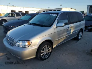 2004 Kia Sedona LX with VIN KNDUP131046591151, listed as a Copart auction lot 82201894 with 147,194 mi miles and Salvage Title. Bid and sale history available at carsss.com. Image 1.