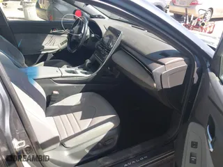 2019 Toyota Avalon Hybrid Limited with VIN 4T1B21FB9KU004539, listed as a IAAI auction lot 41784328 with 99,811 mi miles. Bid and sale history available at carsss.com. Image 5.
