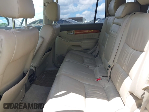 2004 Lexus GX 470 with VIN JTJBT20X640035217, listed as a IAAI auction lot 42156303 with 310,711 mi miles and . Bid and sale history available at DreamBid. Image 8.