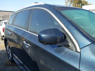 2015 Infiniti QX60 with VIN 5N1AL0MM8FC523309, listed as a IAAI auction lot 42117242 with Not Provided miles and . Bid and sale history available at DreamBid. Image 13.
