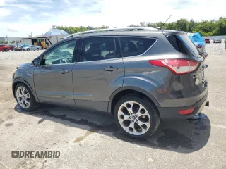 2015 Ford Escape Titanium z VIN 1FMCU0J98FUB06577, wystawiony jako Copart lot #61341175 z przebiegiem 66 206 mil mil oraz Szkoda całkowita • Salvage title. Historia ofert i sprzedaży dostępna na DreamBid. Obrazek 2.